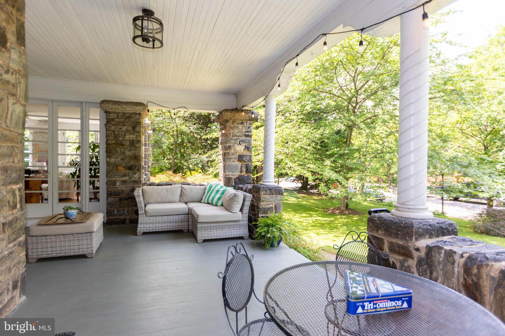4711 Roland Avenue Baltimore, MD 21210 - Photo 7 of 68 a living room with furniture and a large window