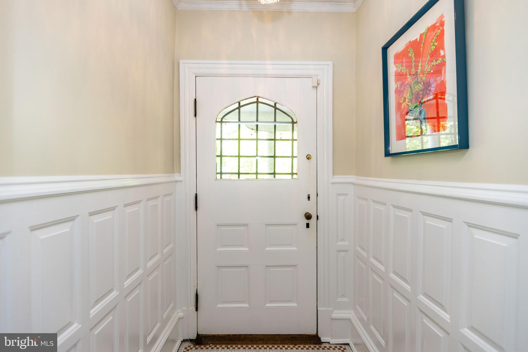 4711 Roland Avenue Baltimore, MD 21210 - Photo 9 of 68 a view of an entryway with wooden floor