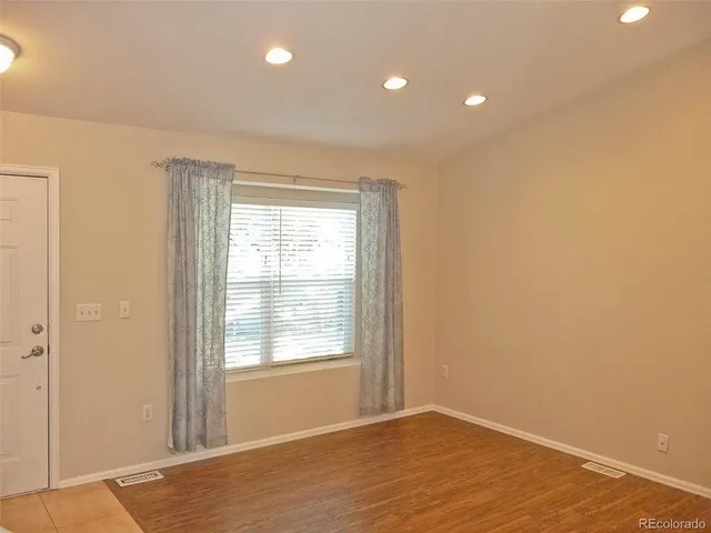 a view of an empty room and window