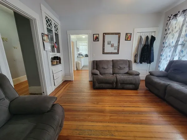 a living room with furniture and a couch