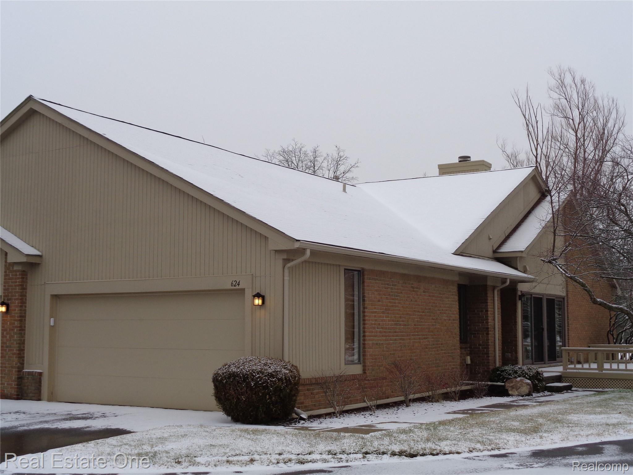 1-story End Unit with 2-car attached garage and NOBODY above you, true ranch style.