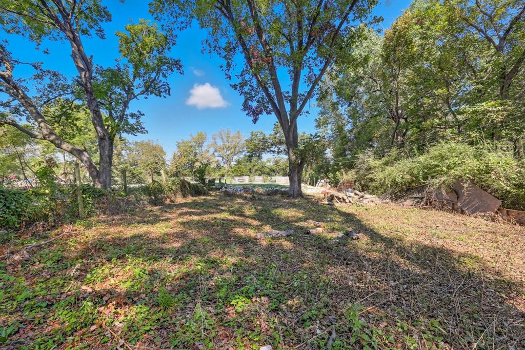 2438 Givendale Road Dallas, TX 75241 - Photo 5 of 6 a view of outdoor space with trees