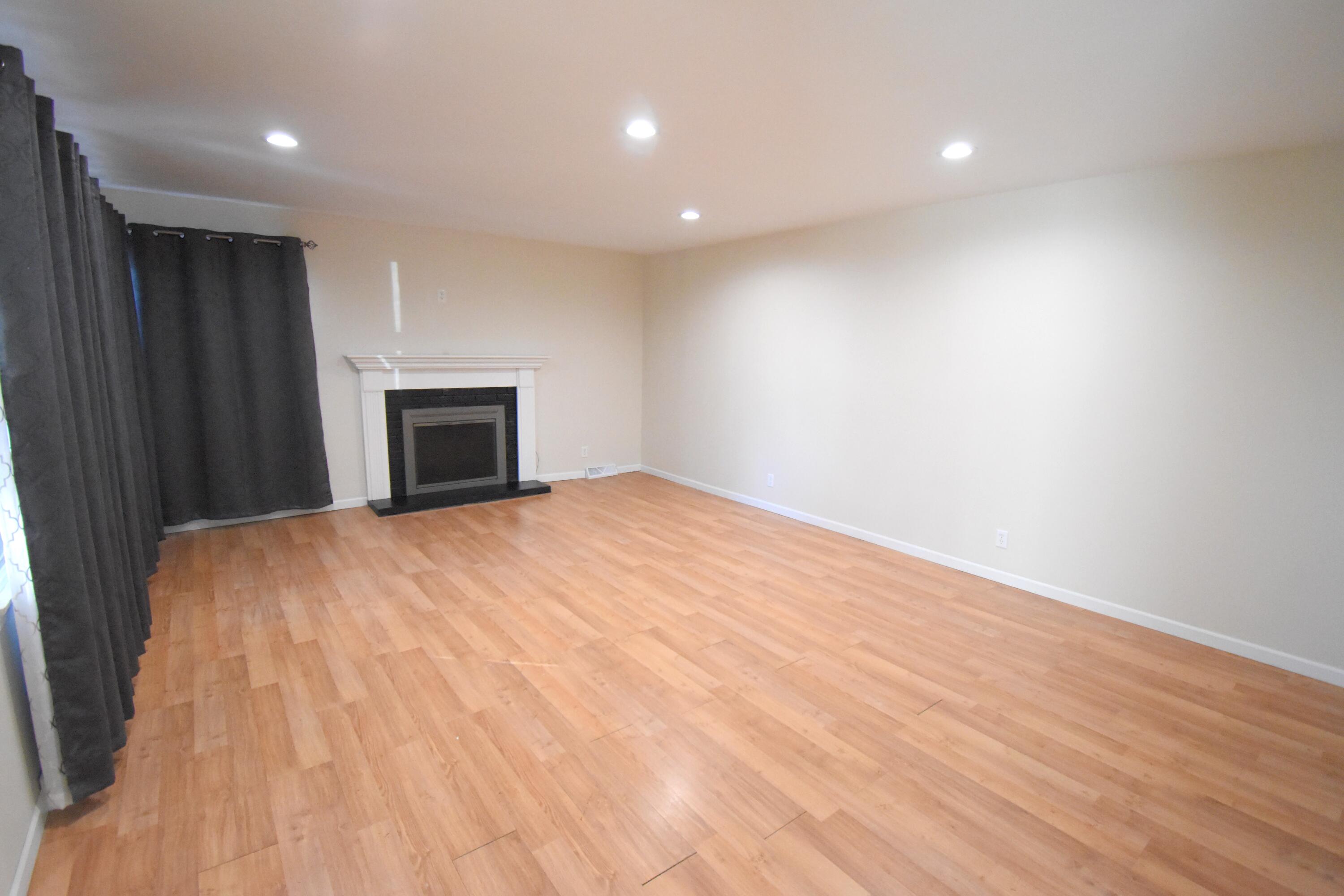 360 East Arnotts Drive Rensselaer, IN 47978 - Photo 12 of 39 a view of empty room with wooden floor