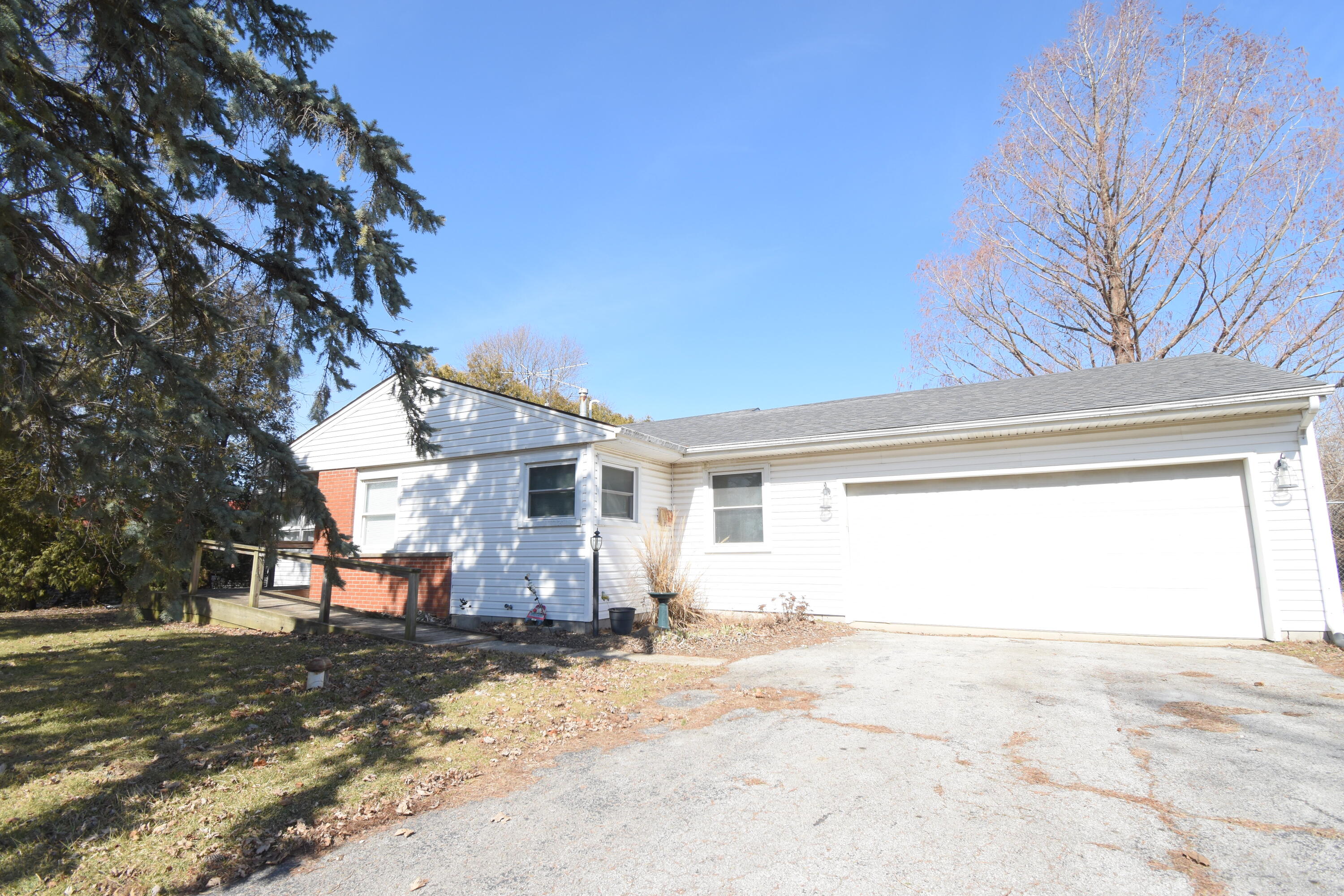 360 East Arnotts Drive Rensselaer, IN 47978 - Photo 2 of 39 a view of a house with a snow in the yard