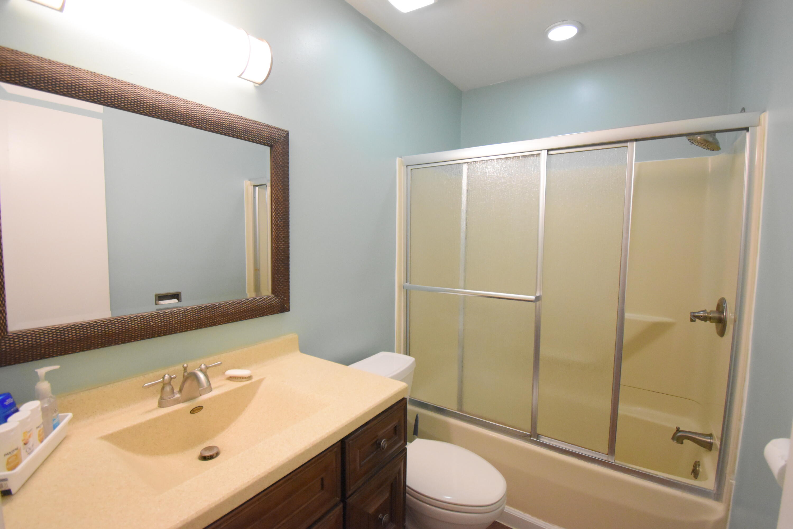 360 East Arnotts Drive Rensselaer, IN 47978 - Photo 26 of 39 a bathroom with a sink a toilet and shower