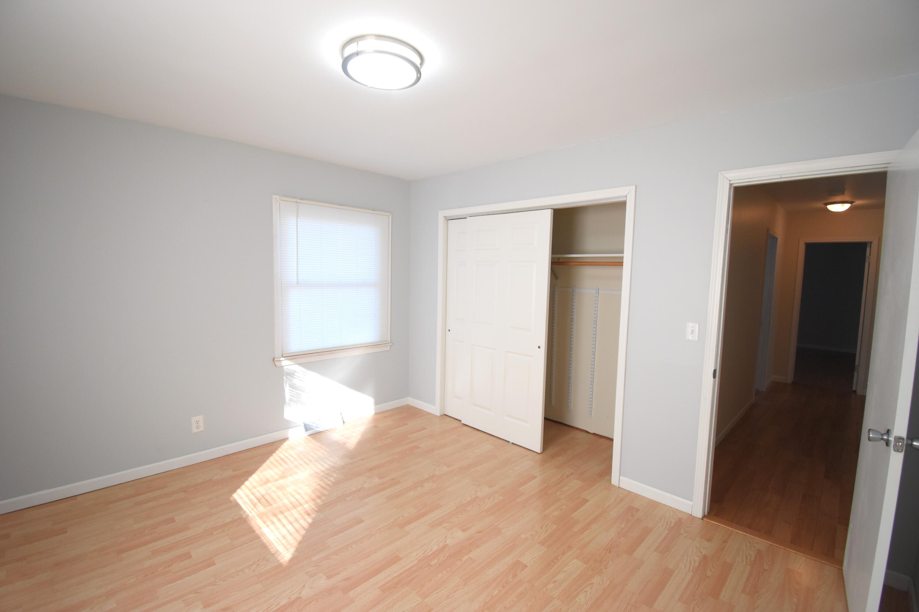 360 East Arnotts Drive Rensselaer, IN 47978 - Photo 31 of 39 a bed room with a bed and a window