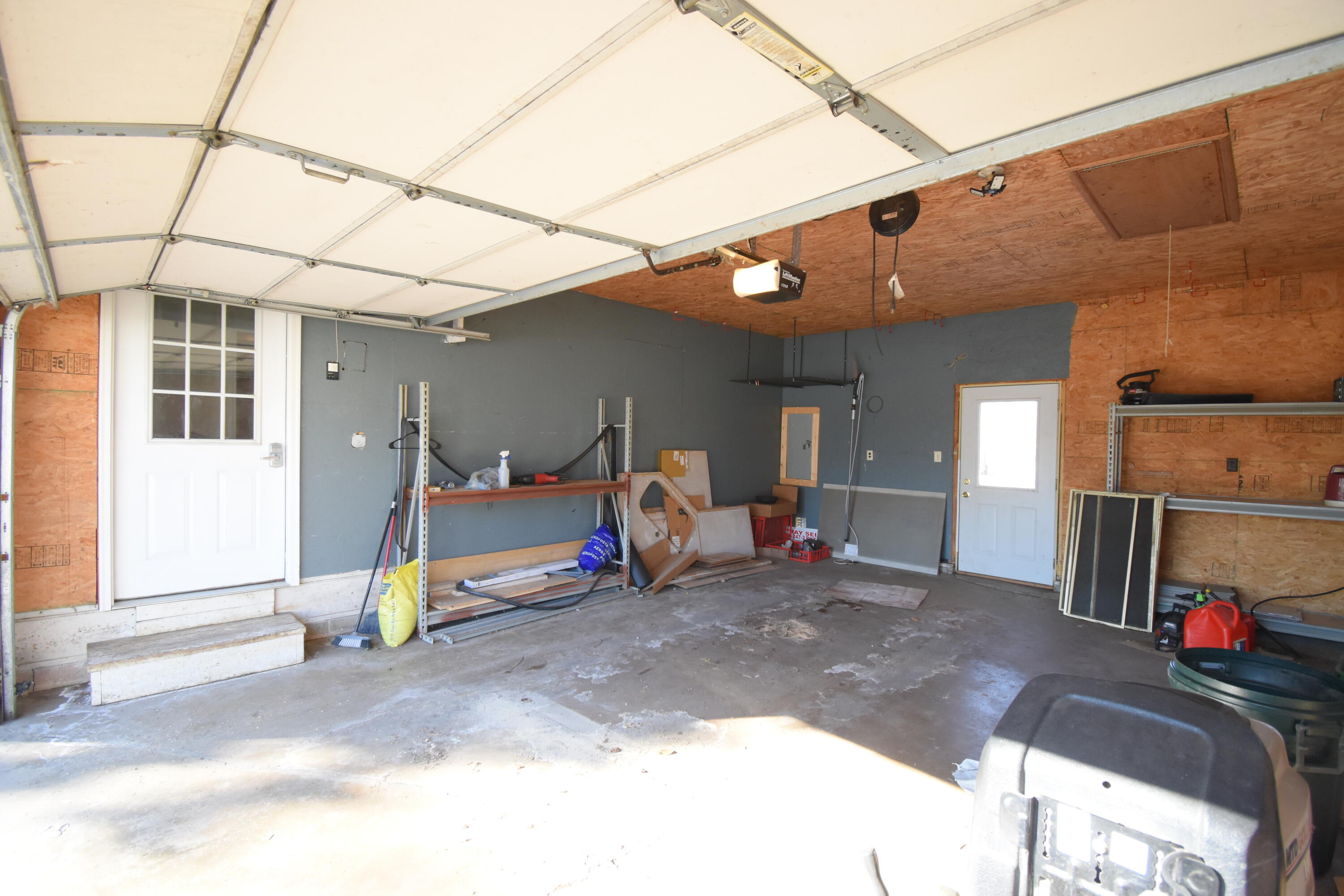 360 East Arnotts Drive Rensselaer, IN 47978 - Photo 38 of 39 a view of a garage with parked cars