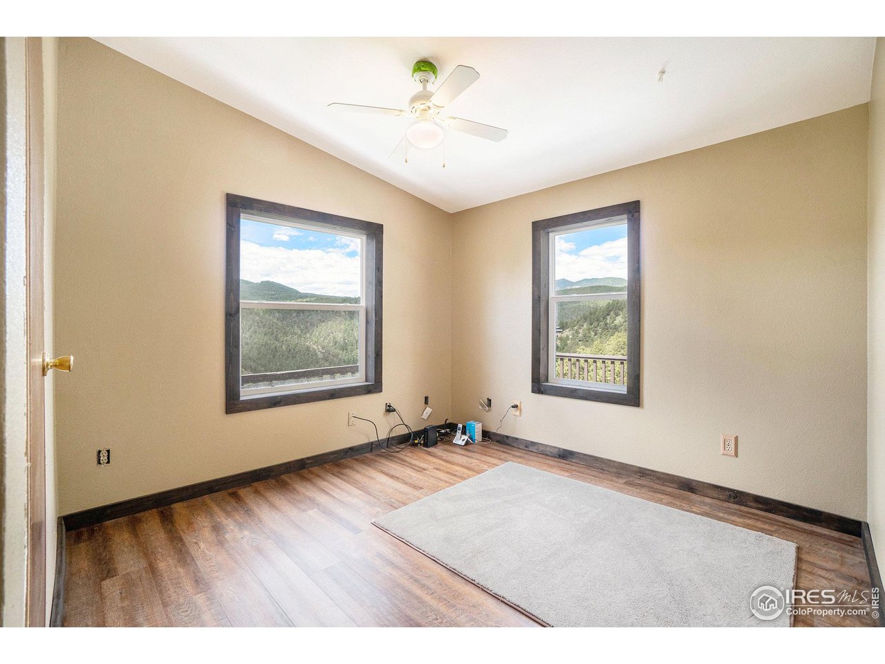 50 Pine Drive Lyons, CO 80540 - Photo 12 of 39 a view of an empty room with a window
