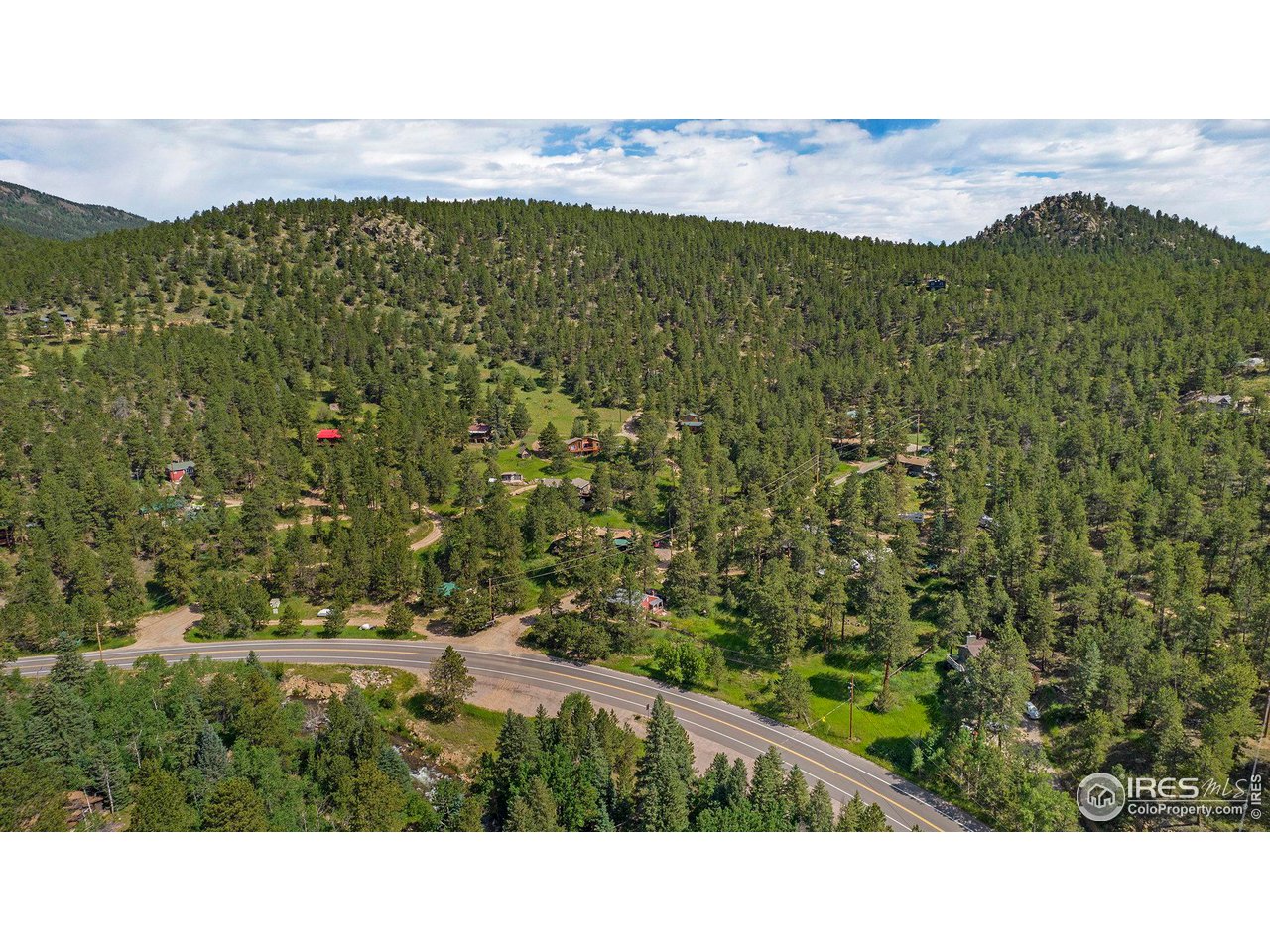 50 Pine Drive Lyons, CO 80540 - Photo 31 of 39 a view of a field with an ocean
