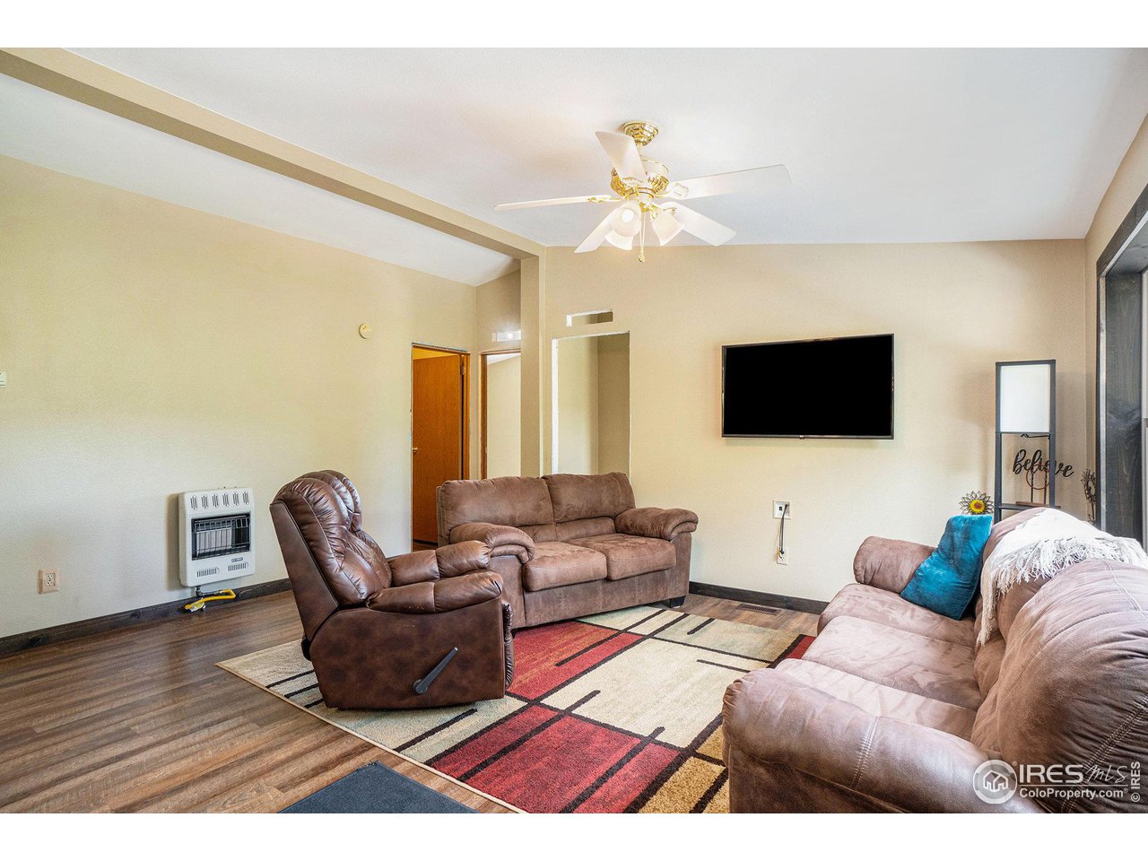 50 Pine Drive Lyons, CO 80540 - Photo 4 of 39 a living room with furniture and a flat screen tv