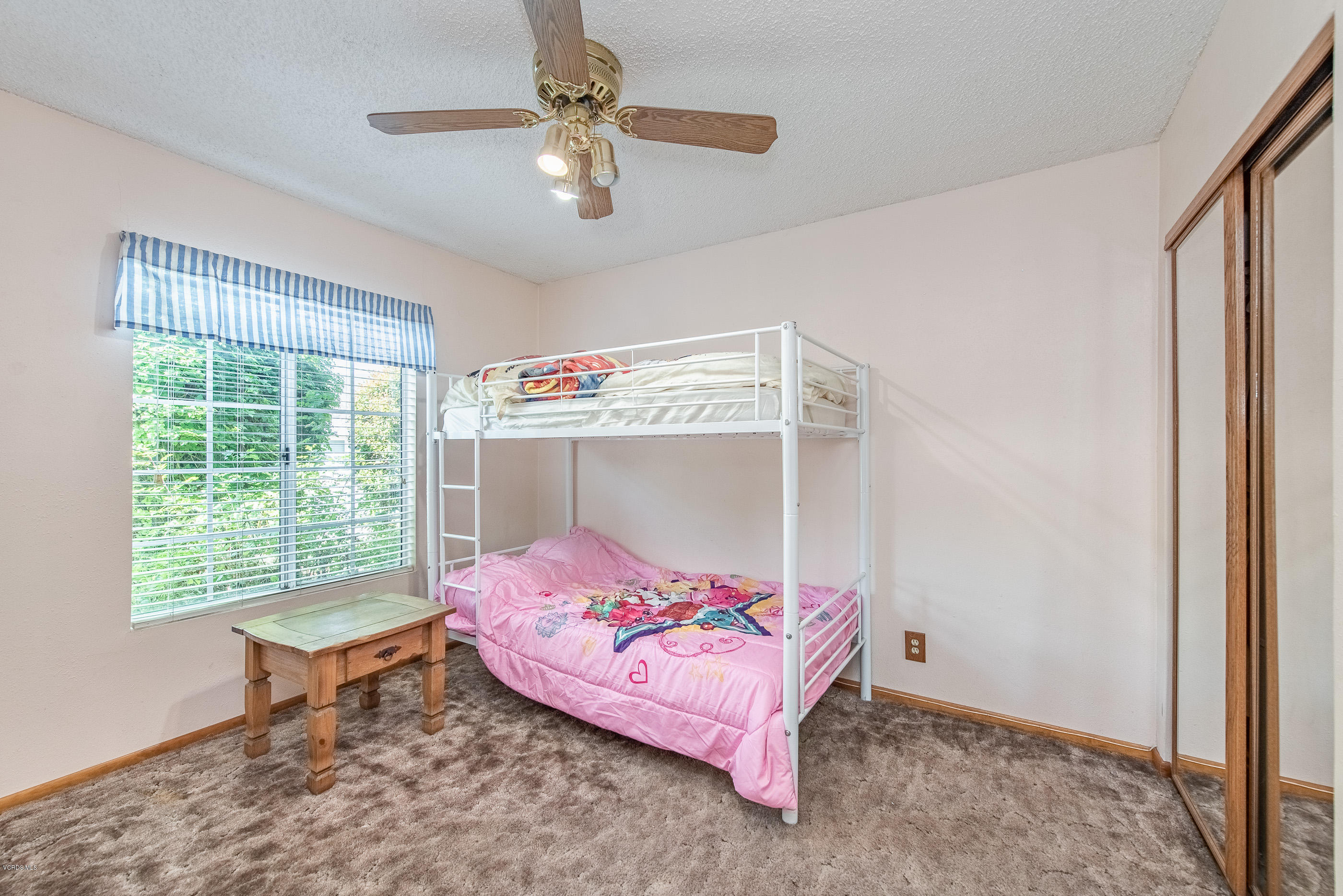 6292 Hope Street Simi Valley, CA 93063 - Photo 14 of 20 a bedroom with a bed and a window