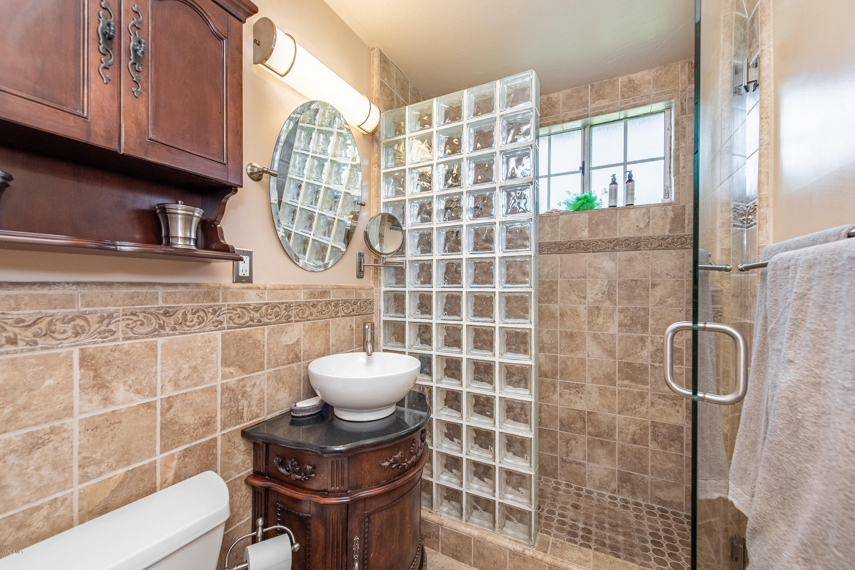 6292 Hope Street Simi Valley, CA 93063 - Photo 15 of 20 a bathroom with a toilet and a sink