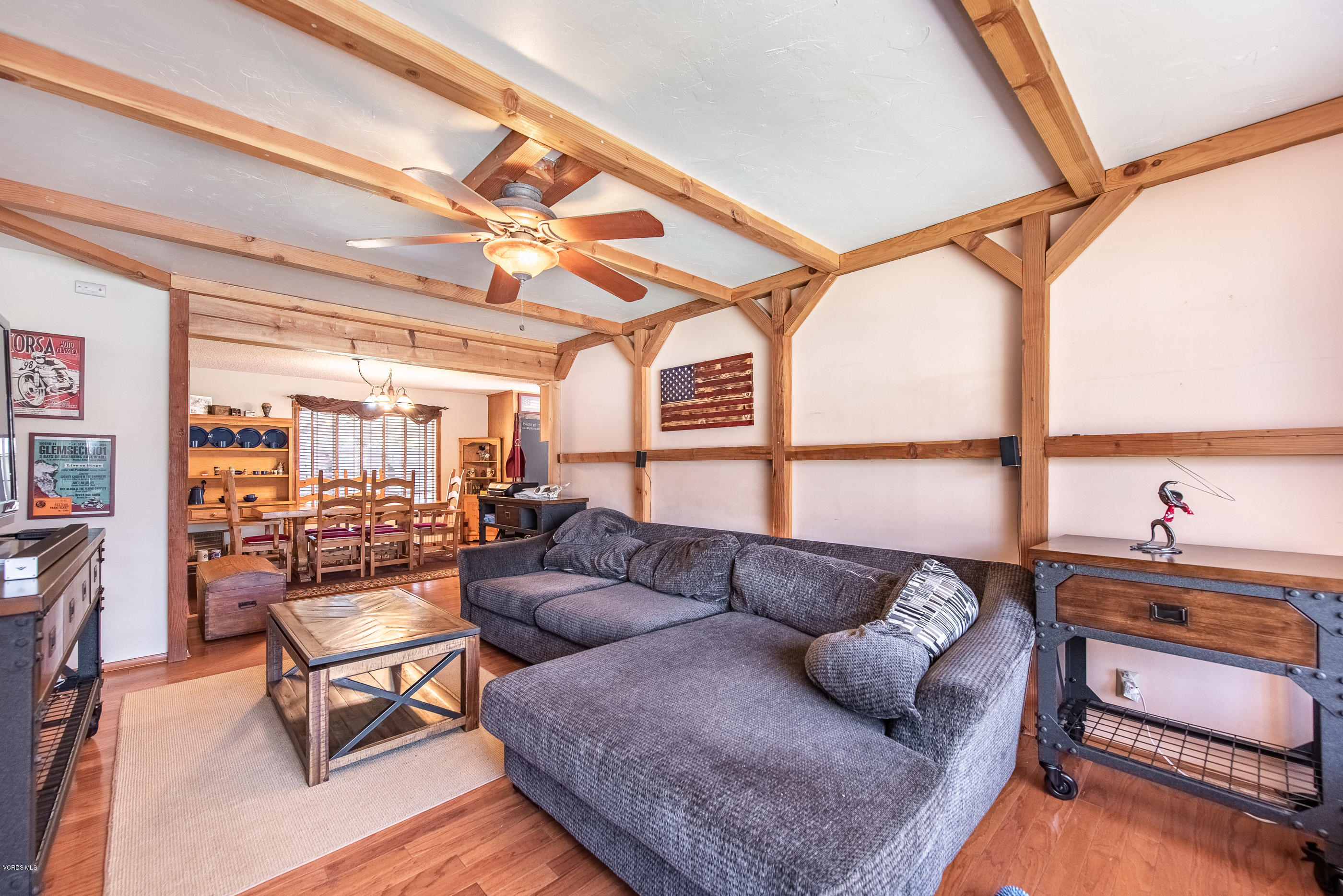 6292 Hope Street Simi Valley, CA 93063 - Photo 4 of 20 a living room with furniture a rug and a floor to ceiling window