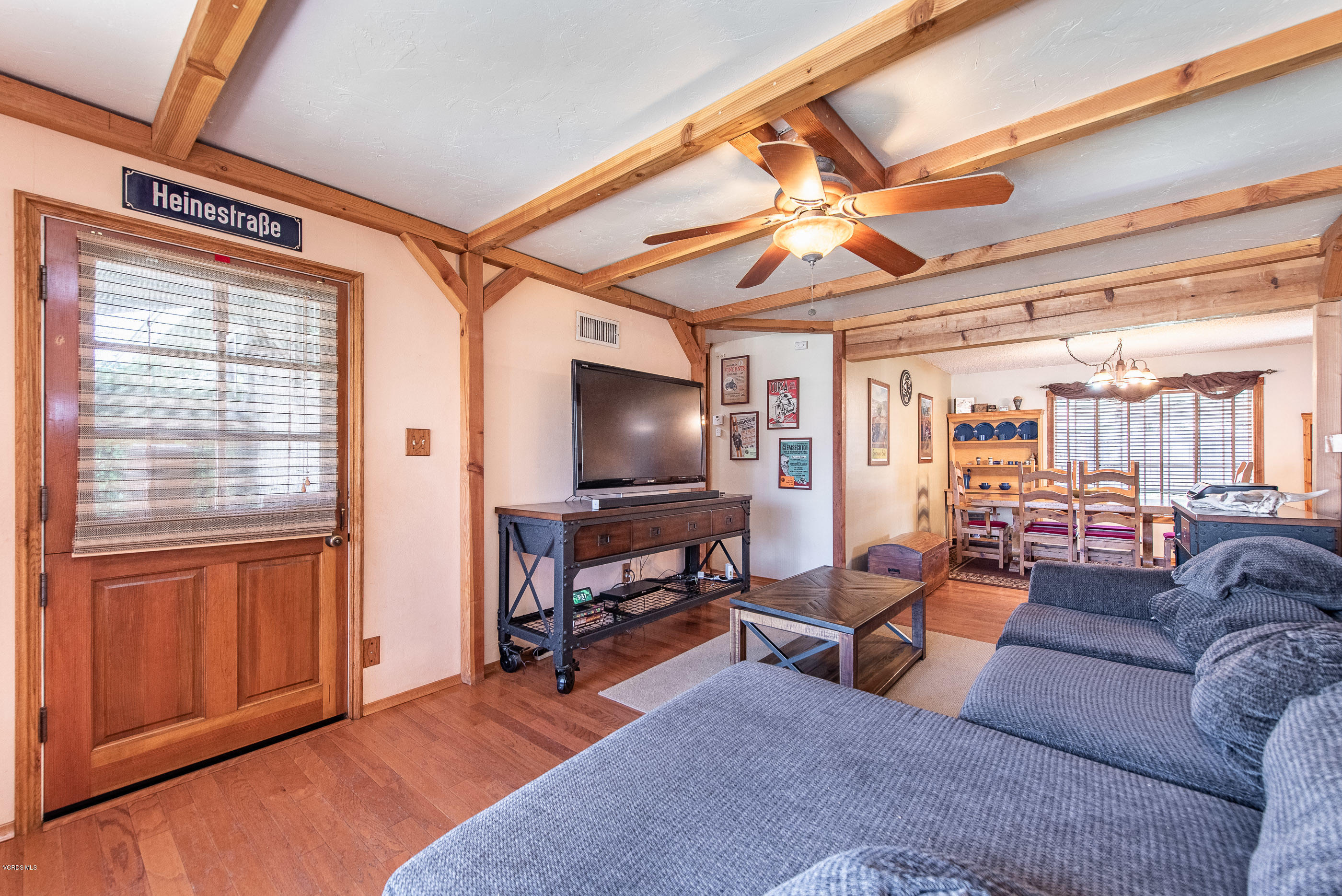 6292 Hope Street Simi Valley, CA 93063 - Photo 5 of 20 a living room with furniture and a flat screen tv