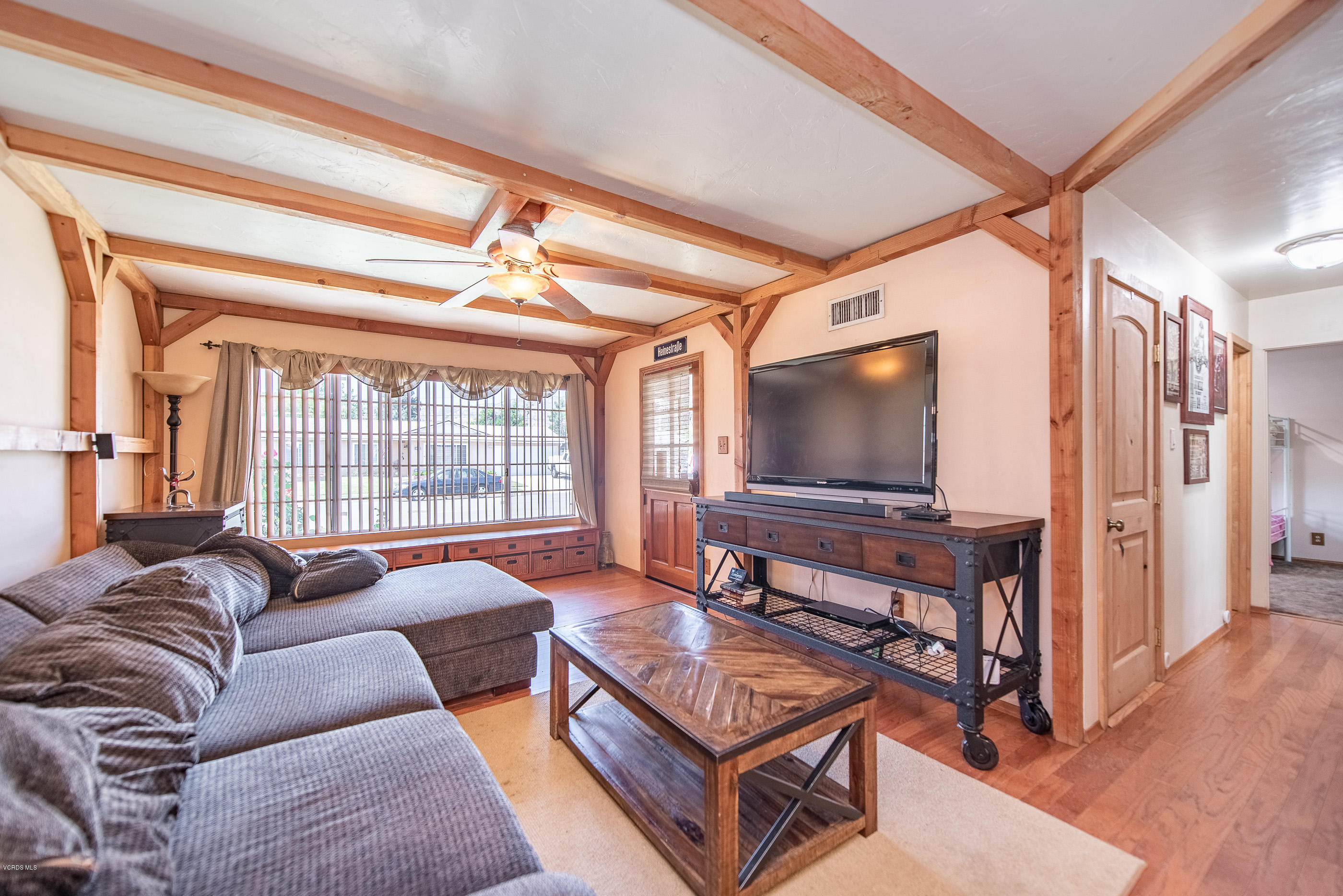 6292 Hope Street Simi Valley, CA 93063 - Photo 6 of 20 a living room with furniture and a flat screen tv