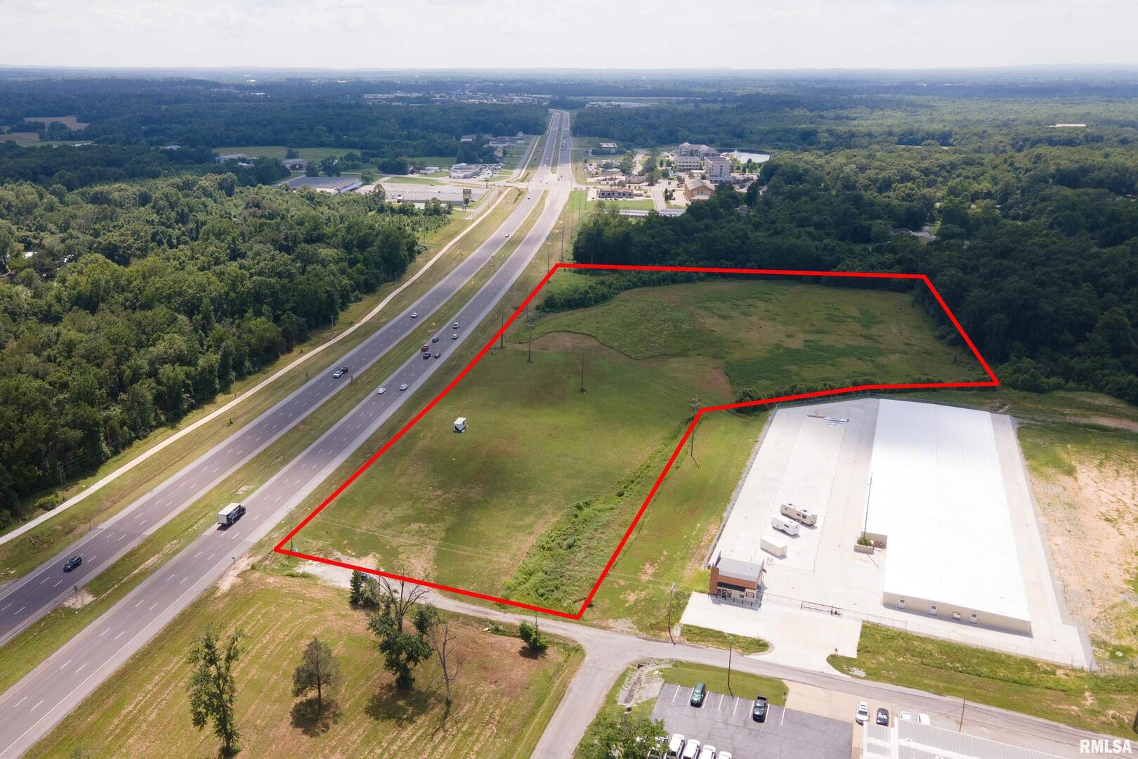 1461 County Line Road Carbondale, IL 62901 - Photo 2 of 5 a view of swimming pool with a balcony and mountain view