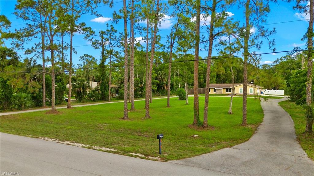 210 29th Street Southwest Naples, FL 34117 - Photo 15 of 17 a view of a park with tree s