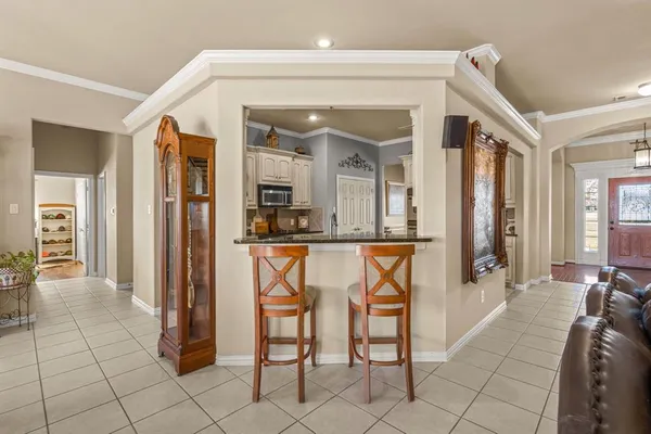 a spacious bathroom with a shower and a sink