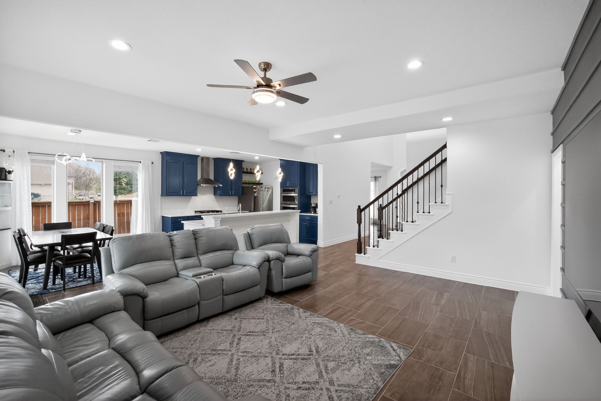 400 Cortona Lane Georgetown, TX 78628 - Photo 14 of 40 Living area with ceiling fan, recessed lighting, and wood finish floors