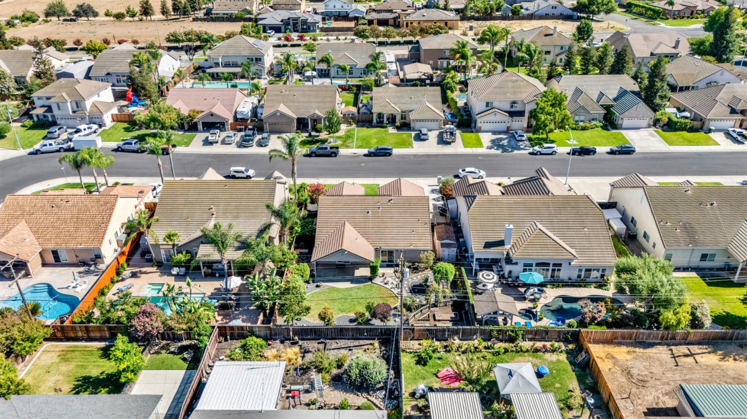1163 Bailey Drive Ripon, CA 95366 - Photo 37 of 37 Birds eye view highlighting the beautifully landscaped property.