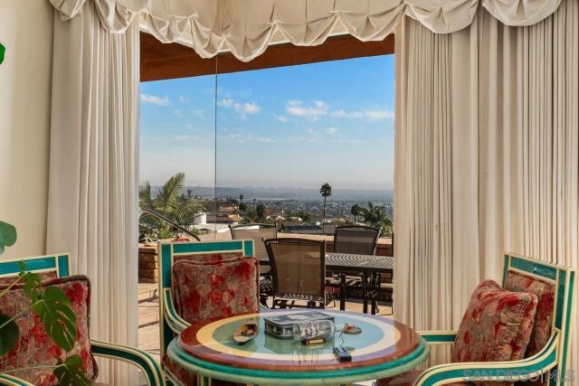 a view of a livingroom with furniture and a couch