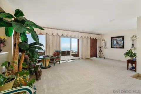 a view of balcony with furniture