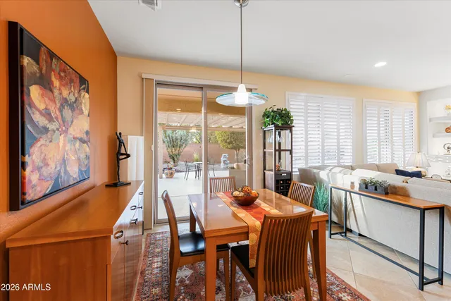 a kitchen with granite countertop a sink and cabinets