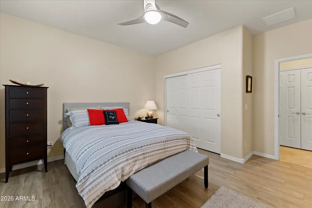 a spacious bathroom with a double vanity sink mirror and shower
