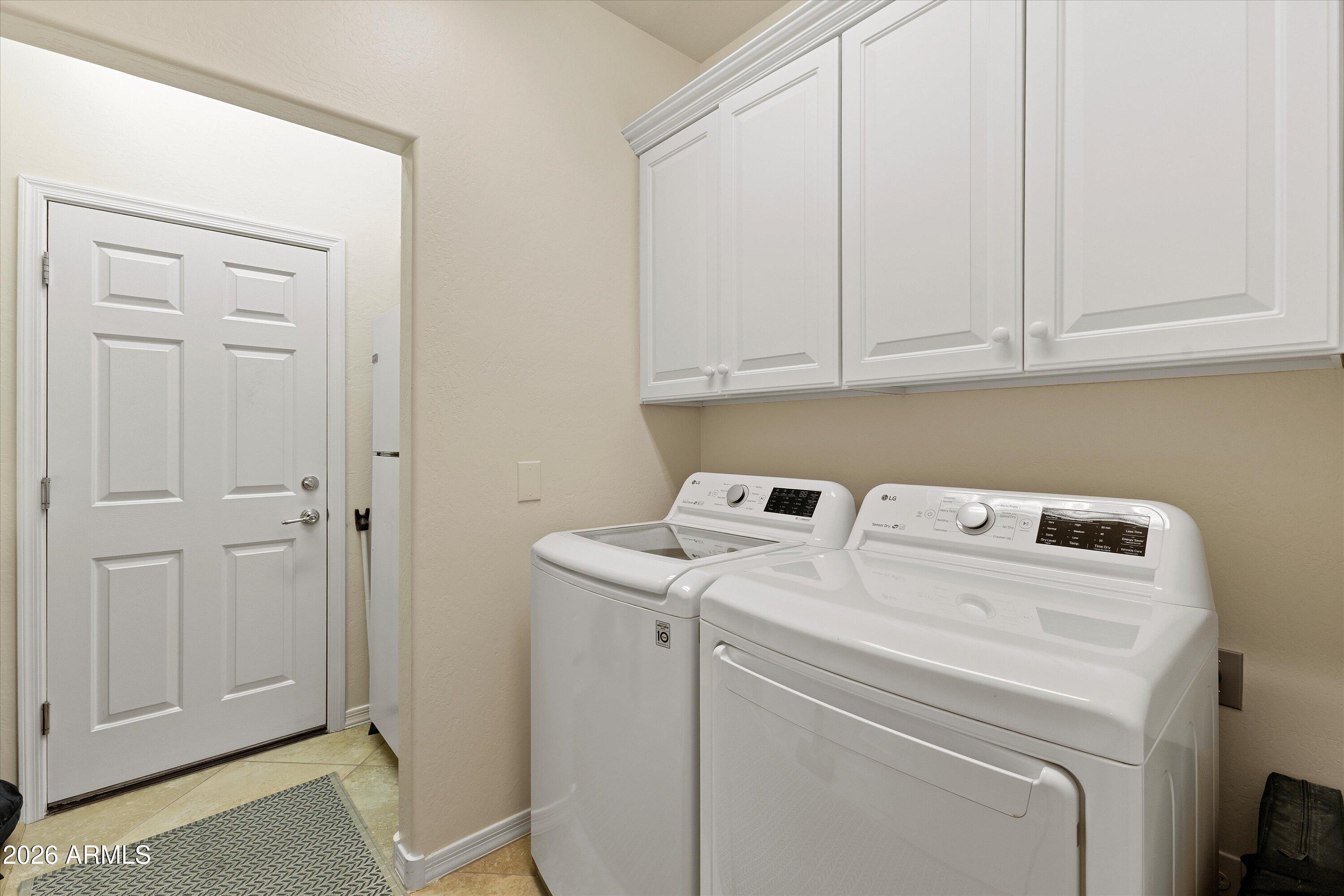 20652 North 267th Avenue Buckeye, AZ 85396 - Photo 33 of 53 a utility room with dryer and washer