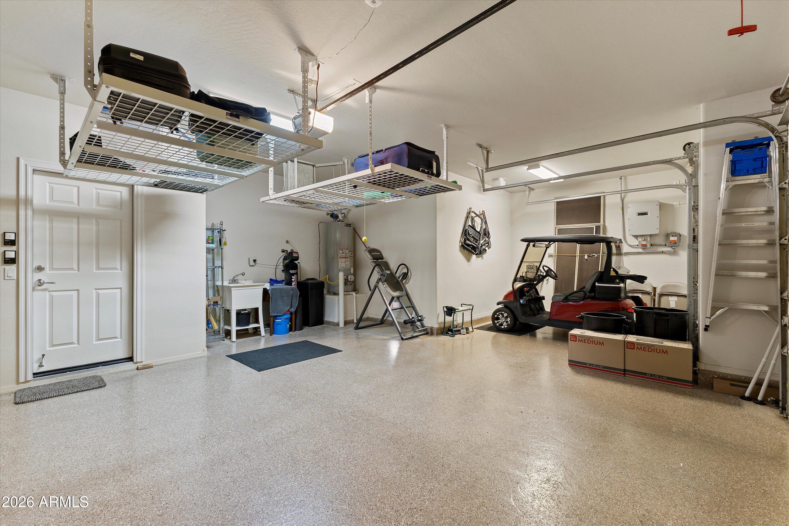 20652 North 267th Avenue Buckeye, AZ 85396 - Photo 35 of 53 a view of a garage with furniture