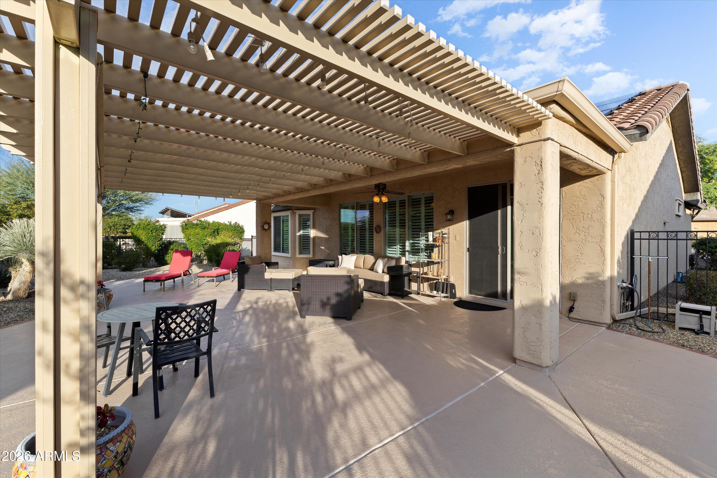 20652 North 267th Avenue Buckeye, AZ 85396 - Photo 41 of 53 a view of a porch with furniture and a grill