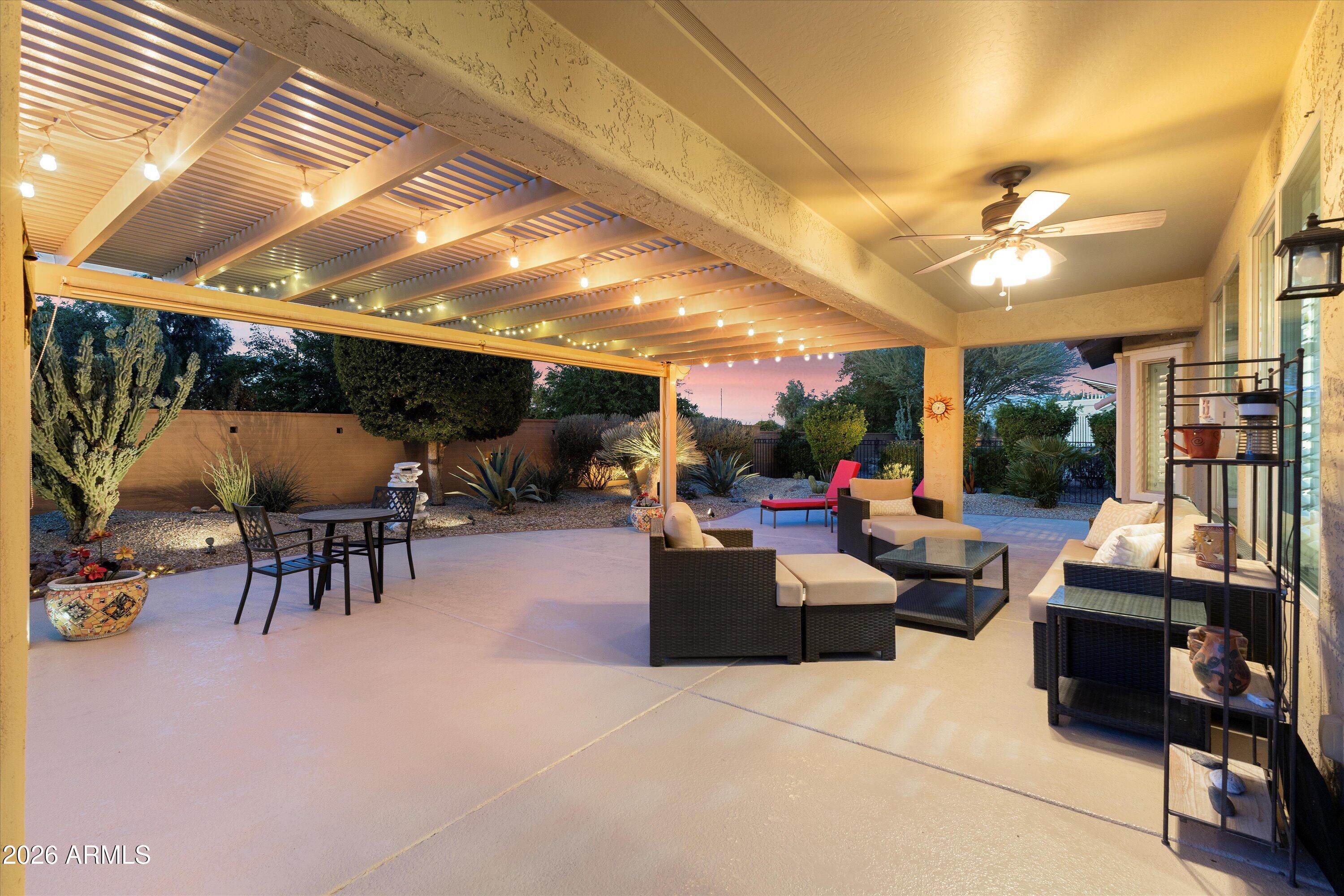20652 North 267th Avenue Buckeye, AZ 85396 - Photo 47 of 53 a living room with furniture and a table