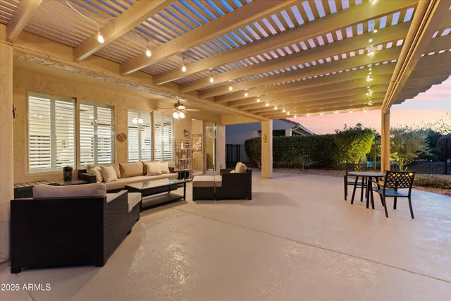a living room with furniture and a table