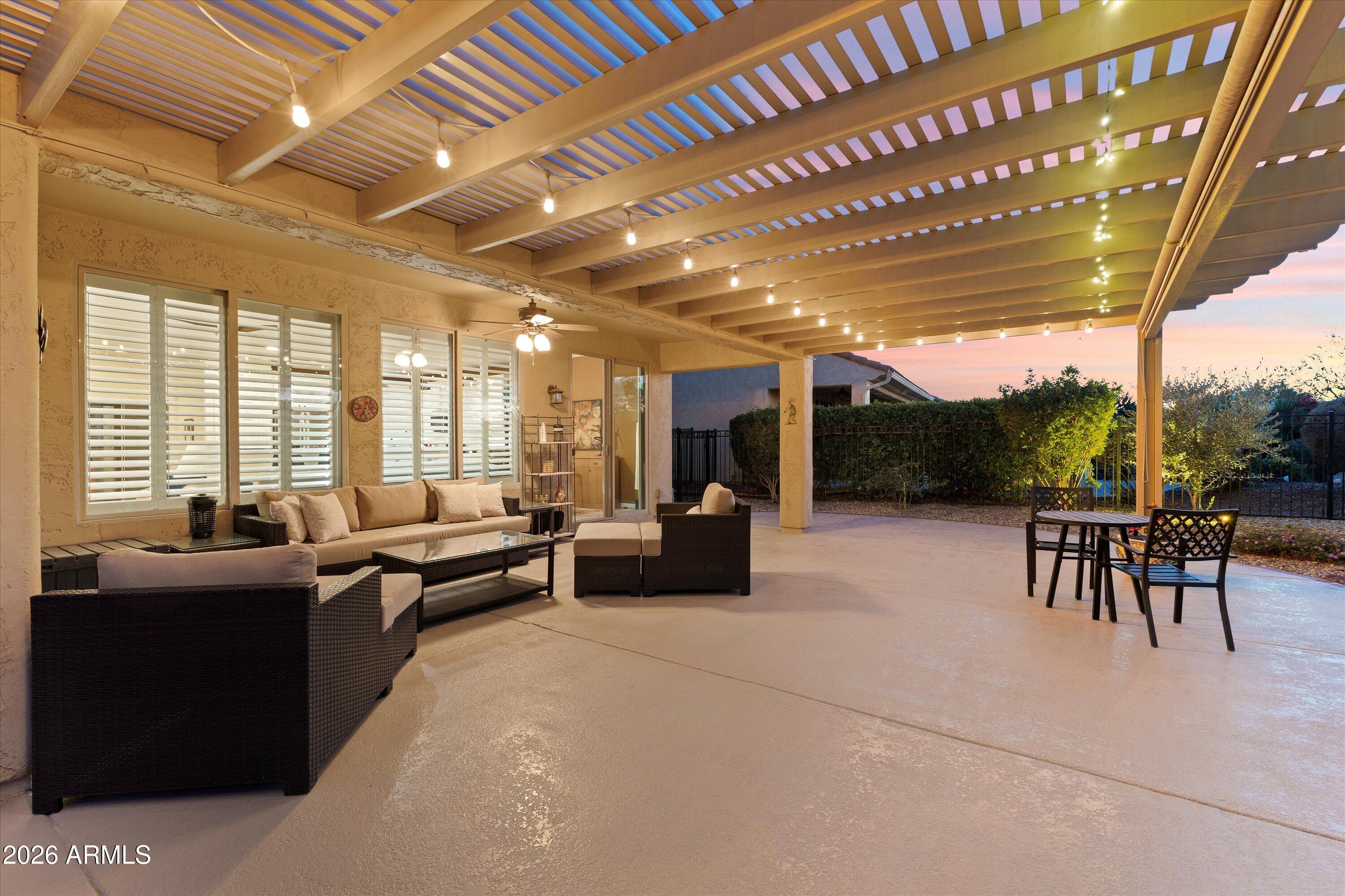 20652 North 267th Avenue Buckeye, AZ 85396 - Photo 49 of 53 a living room with furniture and a large window