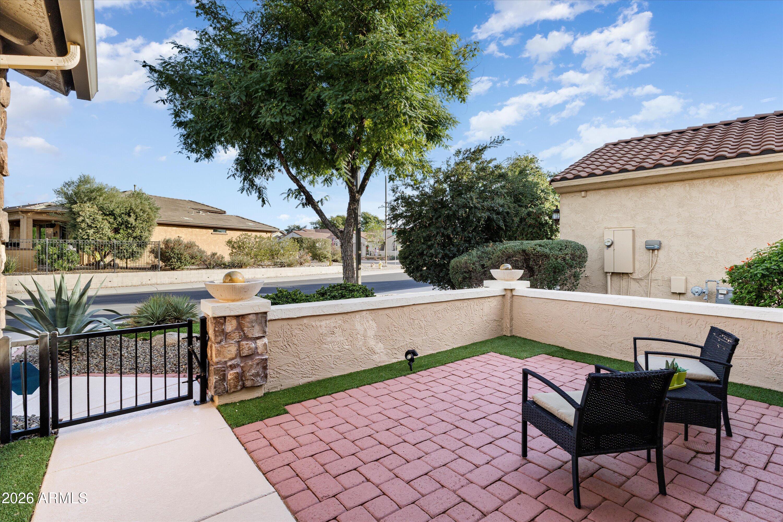 20652 North 267th Avenue Buckeye, AZ 85396 - Photo 8 of 53 a view of a chairs and table in the balcony