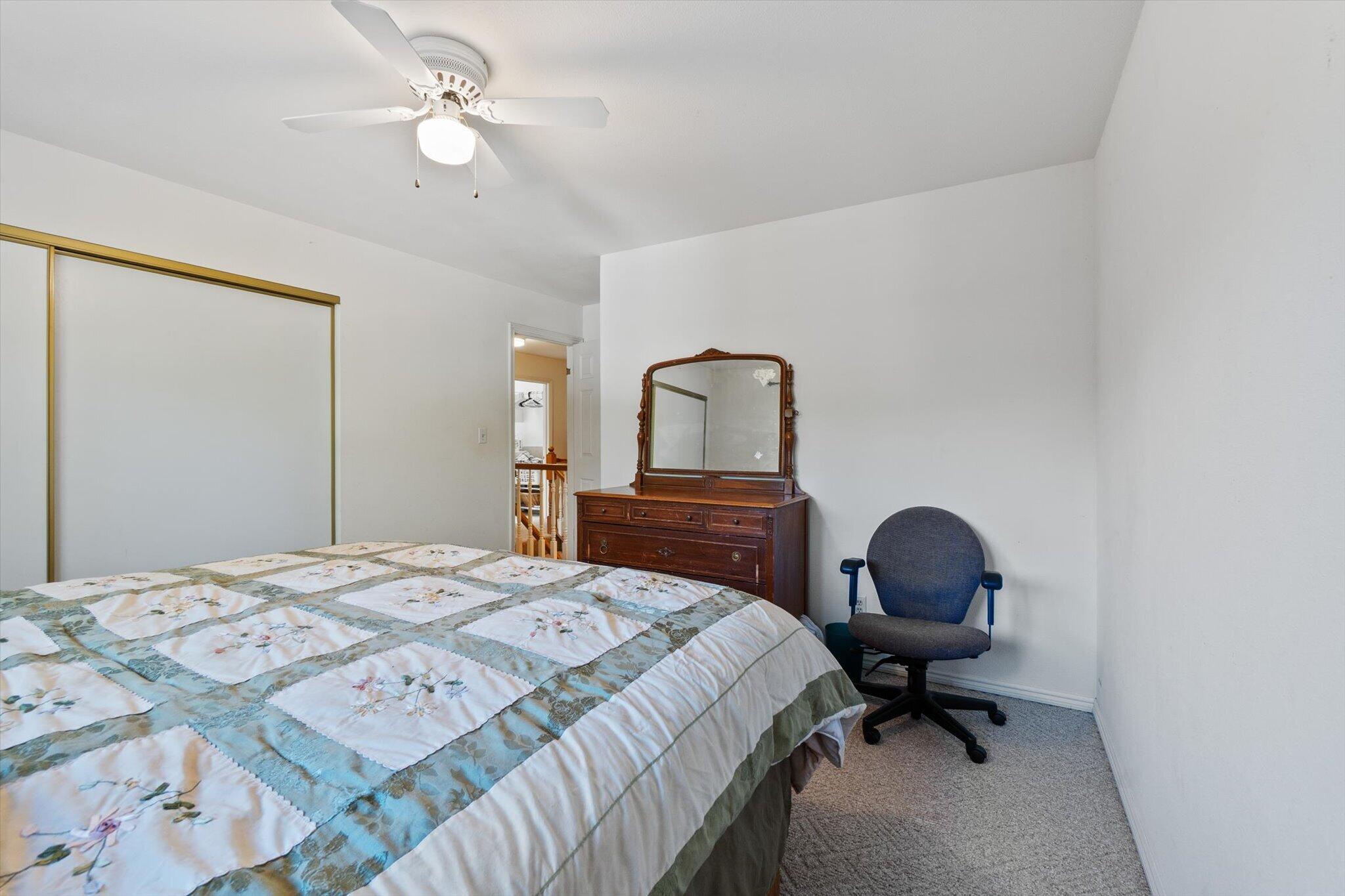 26997 Lookout Mountain Road Oak Run, CA 96069 - Photo 42 of 92 a bedroom with a bed a desk and chair