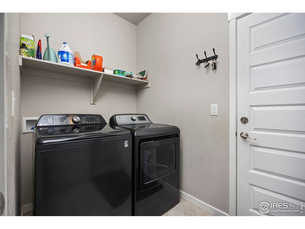 1344 87th Avenue Greeley, CO 80634 - Photo 17 of 31 a utility room with lots of appliances