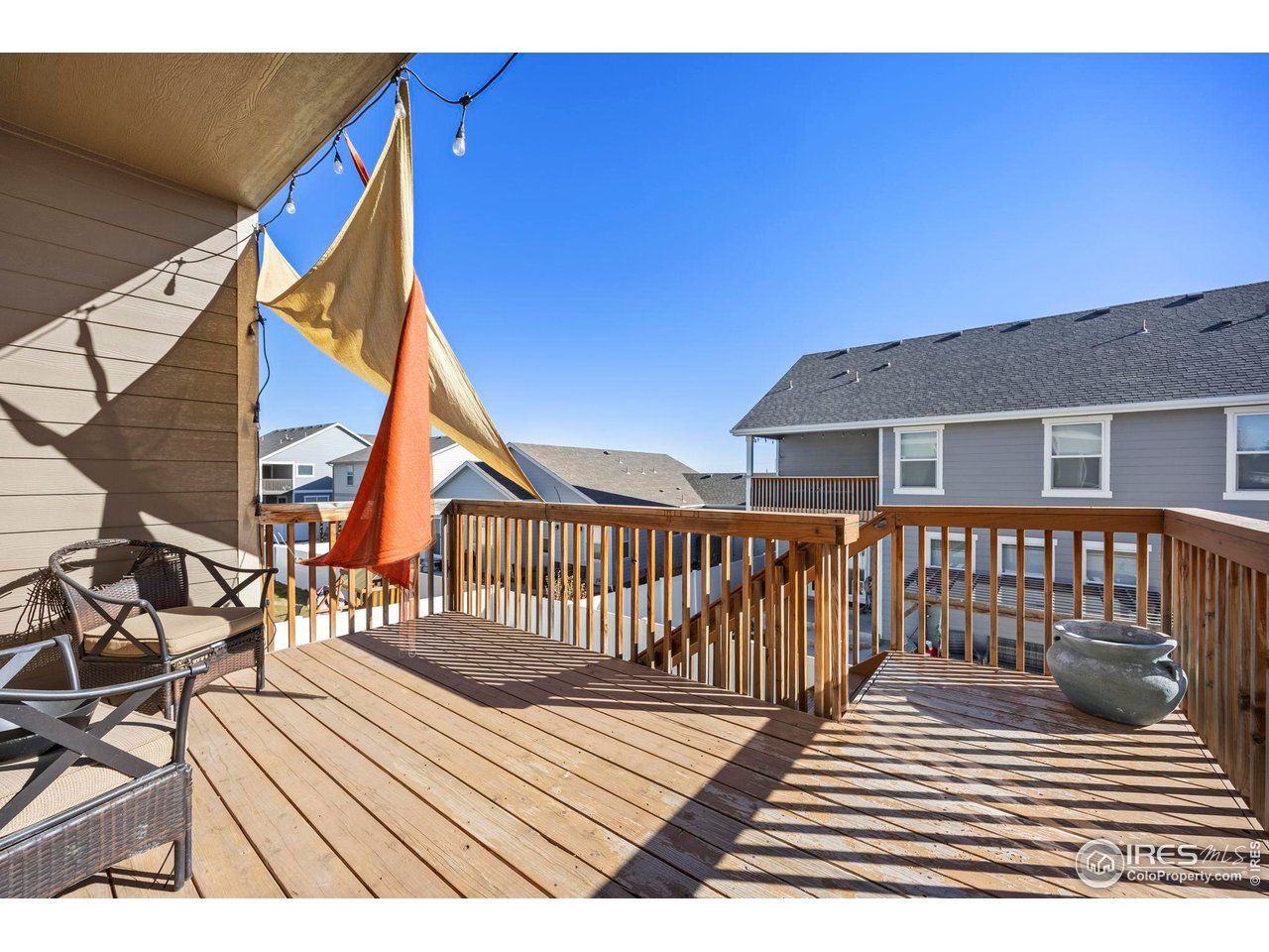 1344 87th Avenue Greeley, CO 80634 - Photo 25 of 31 a view of a house with wooden floor