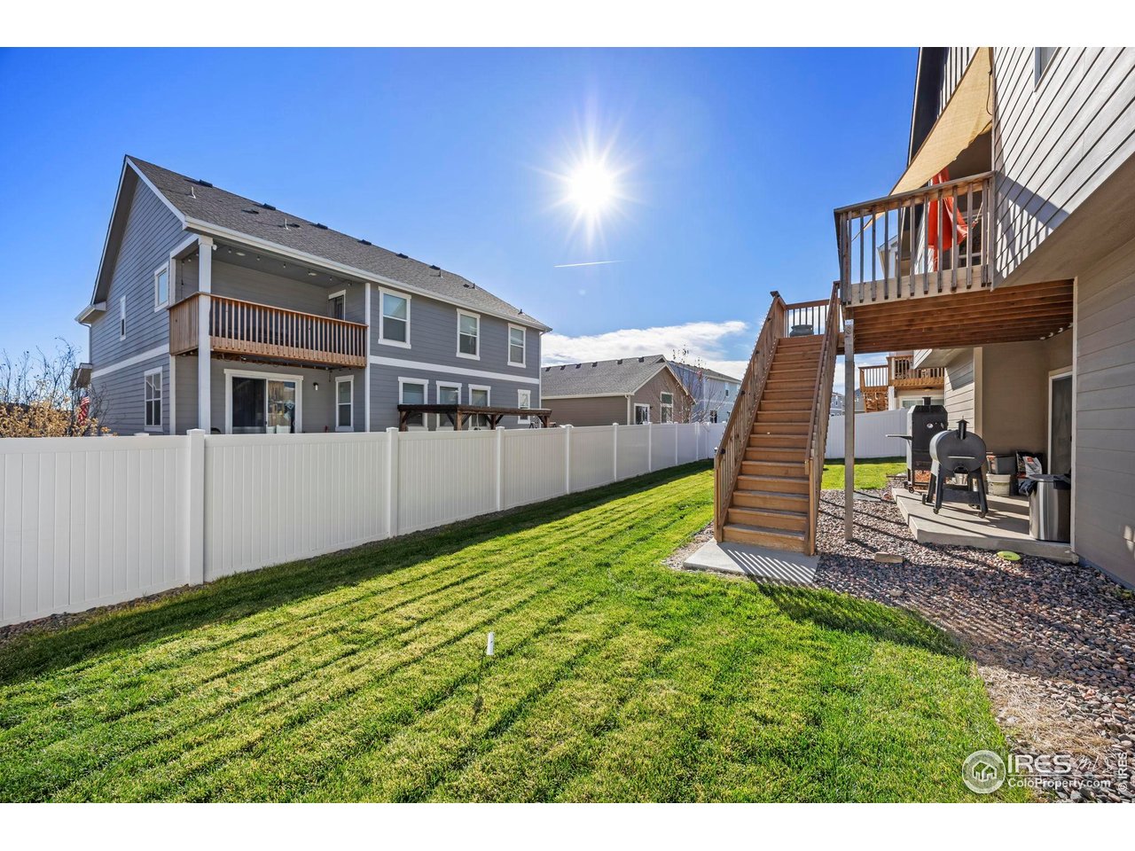 1344 87th Avenue Greeley, CO 80634 - Photo 26 of 31 a view of an house with backyard porch and furniture