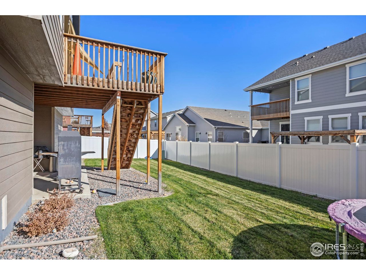 1344 87th Avenue Greeley, CO 80634 - Photo 30 of 31 a view of a backyard of the house