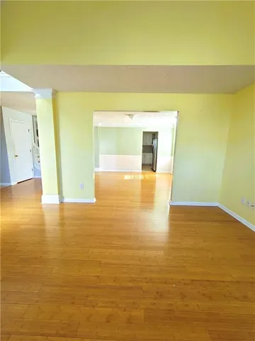 a view of a swimming pool and an empty space