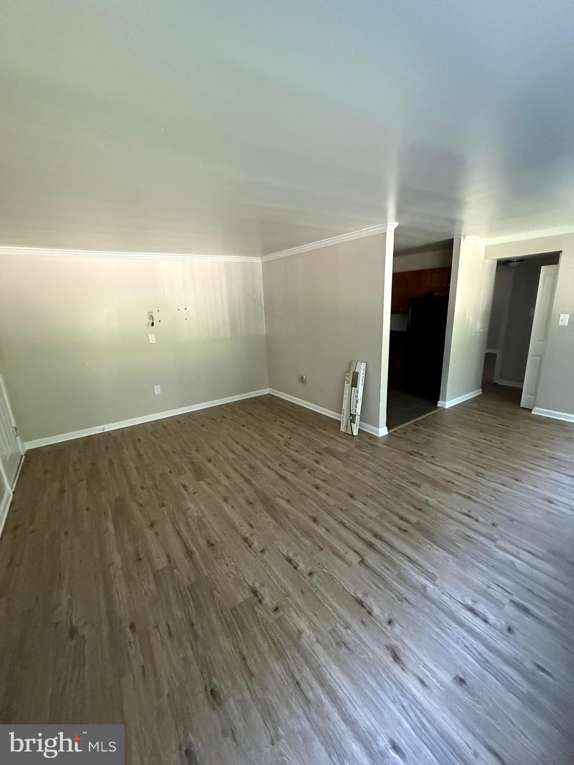 3105 Naylor Road Southeast, Unit 104 Washington, DC 20020 - Photo 10 of 12 wooden floor in an empty room