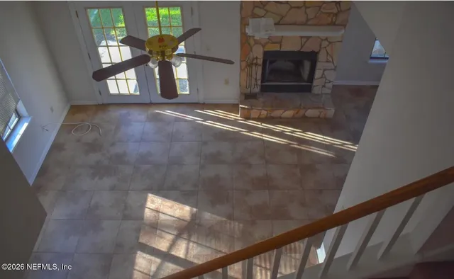 a view of an empty room and window