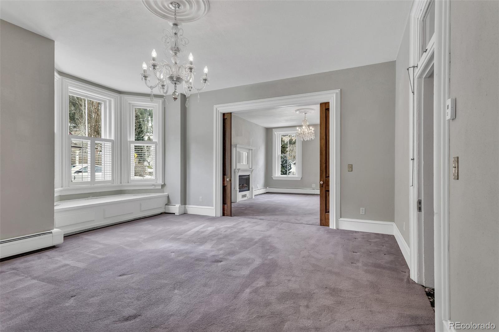 300 Rose Street Georgetown, CO 80444 - Photo 16 of 49 a view of a big room with windows and chandelier