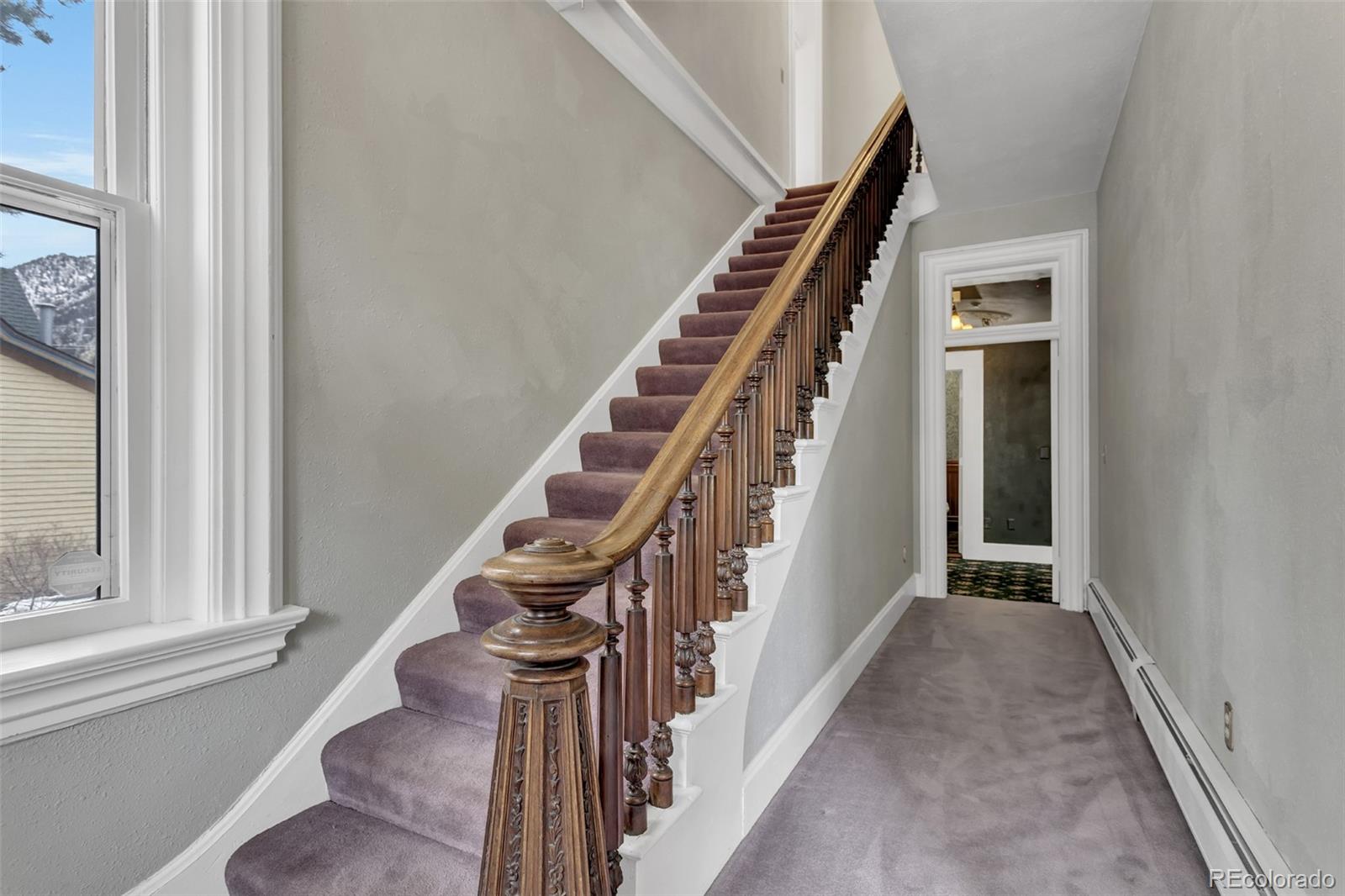 300 Rose Street Georgetown, CO 80444 - Photo 18 of 49 a view of staircase with wooden floor and stairs