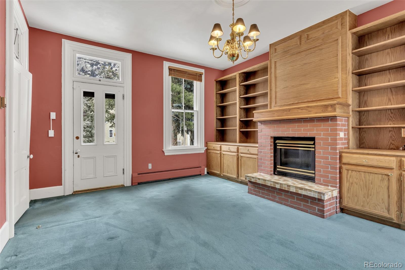 300 Rose Street Georgetown, CO 80444 - Photo 22 of 49 a view of livingroom with furniture fire place and window