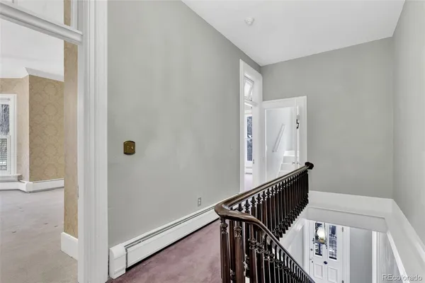 a view of a hallway with entryway