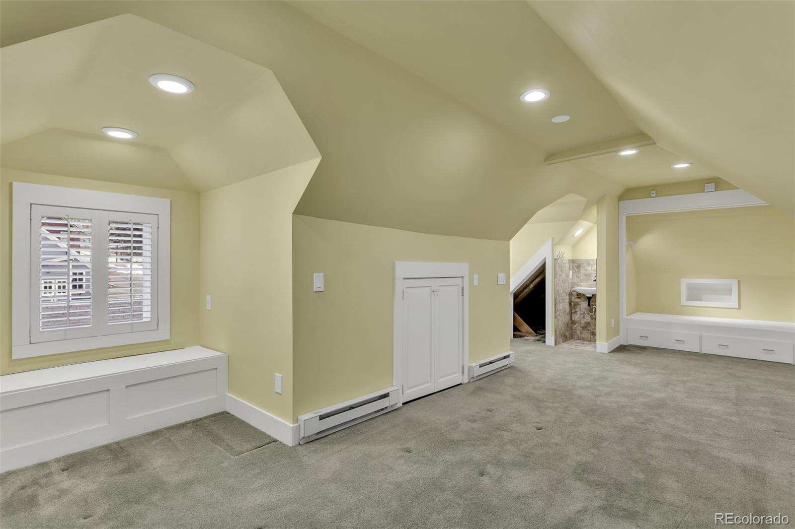 300 Rose Street Georgetown, CO 80444 - Photo 39 of 49 a view of an empty room with a fireplace and a window