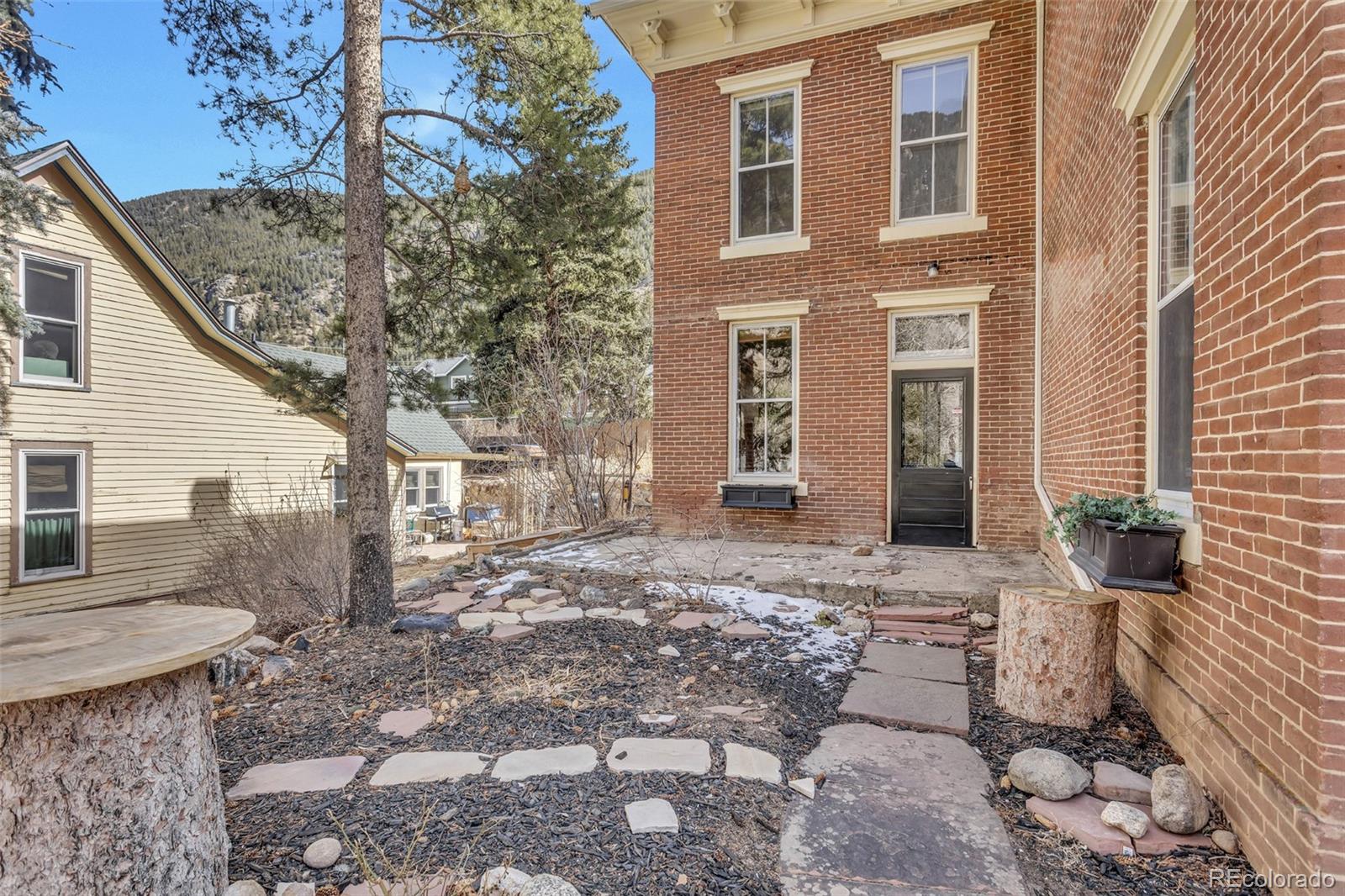 300 Rose Street Georgetown, CO 80444 - Photo 41 of 49 a view of a house with a yard