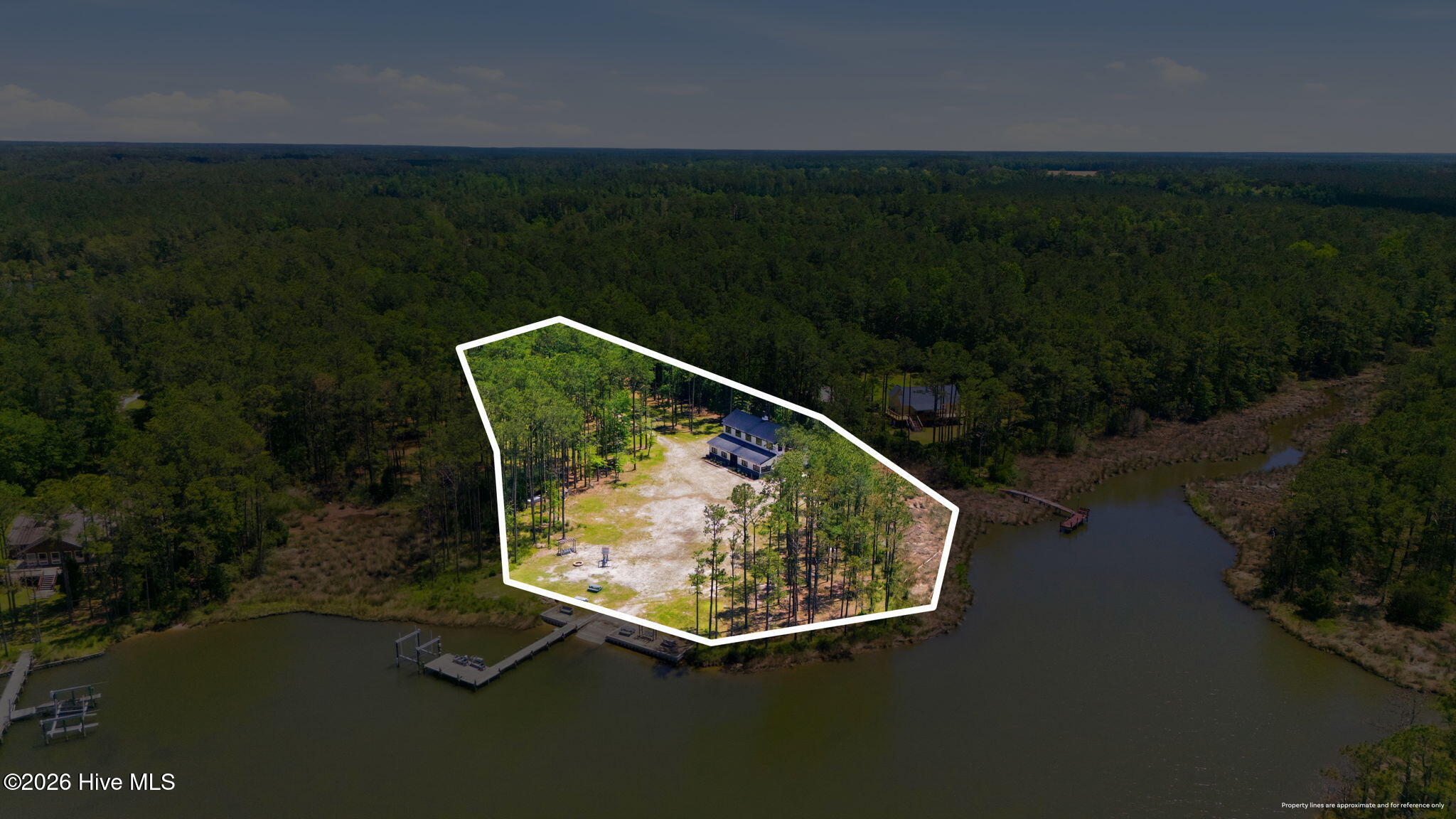 407 Point Of View Drive Merritt, NC 28556 - Photo 2 of 72 8-web-or-mls-DJI_20260520141003_0041_D_e